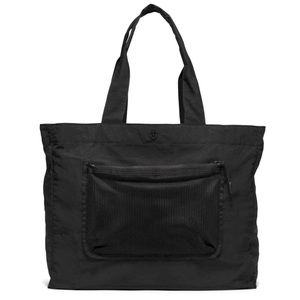 Lululemon pack the pocket tote, brand new never used in black